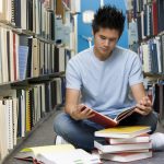 University student working in library